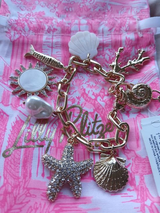 Lilly Pulitzer Jewelry - Lilly Pulitzer Gold-tone Sea Life Charm Bracelet with Pink Accents
